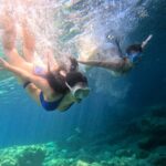 Girls Diving Together in the sea