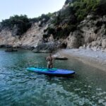 a Girl Touring in Marathia Zakynthos SUP Boat Tour – Paddle & Explore Hidden Gems