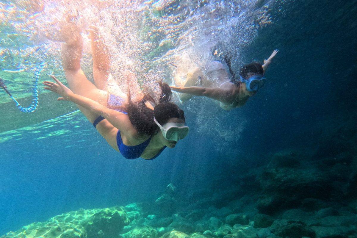 Girls Diving Together in the sea